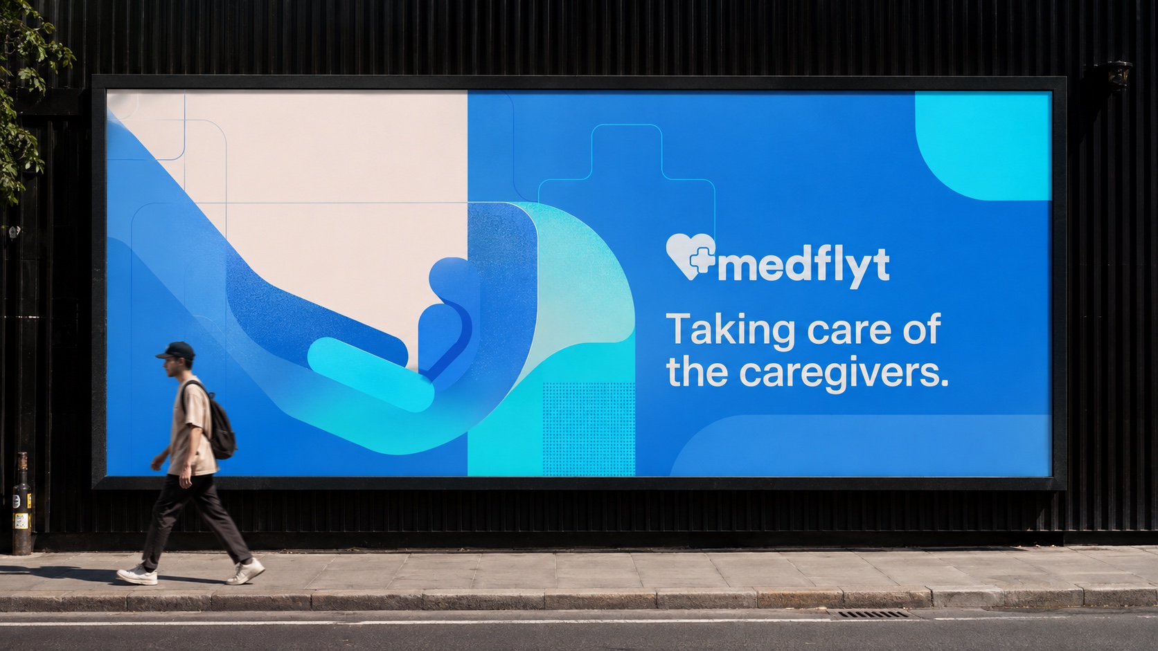 Medflyt street billboard in deep blue — Taking care of the caregivers. — a hand of brand shapes holding a figure