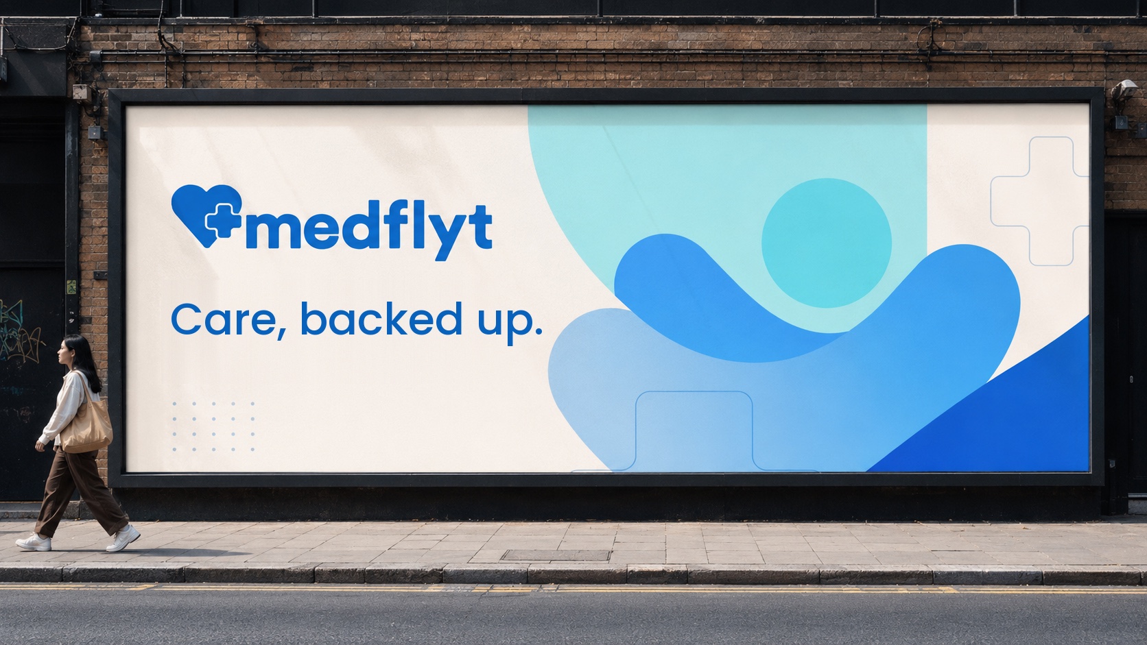 Medflyt street billboard on brick — Care, backed up. — soft blue shapes cradling a circle