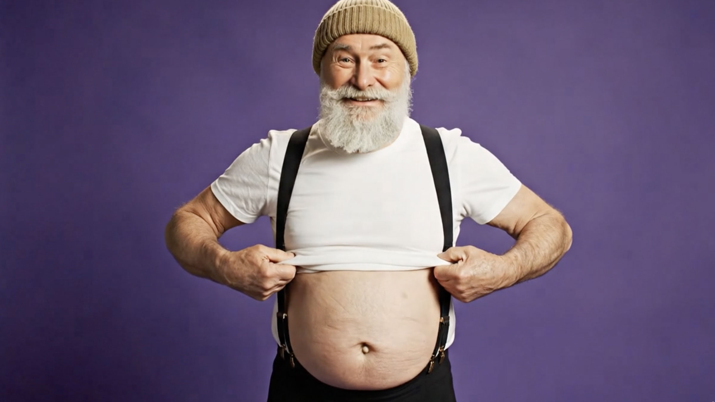 Pupok — a bearded man proudly showing his belly button